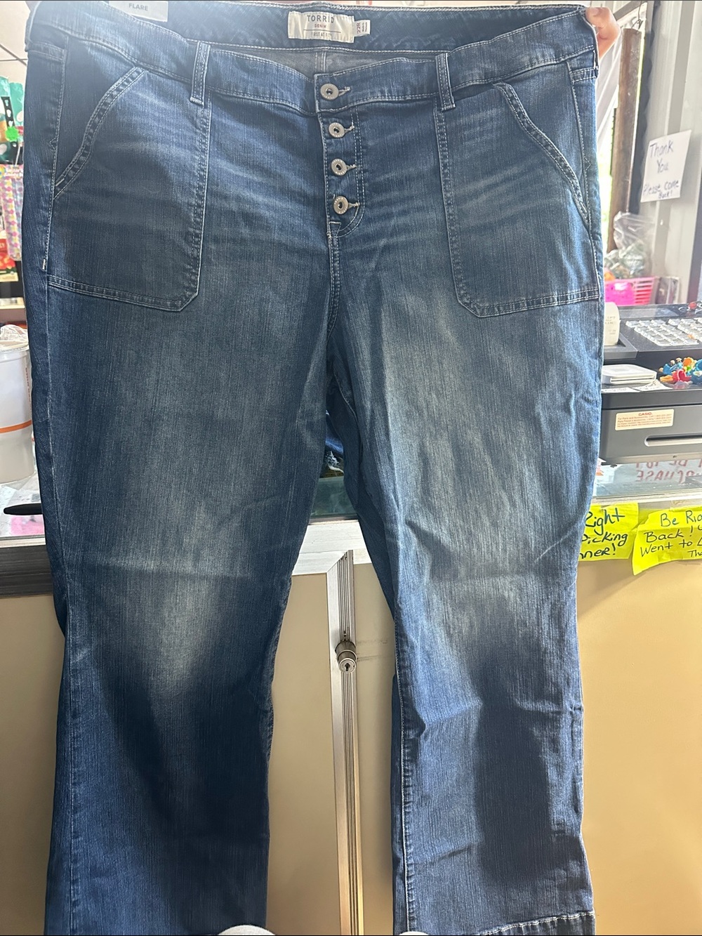 torrid Mid-Rise Flare Jeans in Faded Blue Wash
